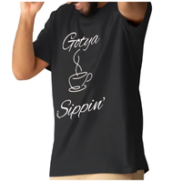 Black Gotya Sippin’ Tee with coffee cup graphic from The GOTYA Collection, made of soft cotton blend